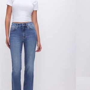 Good American Blue Straight Leg Jeans with rips on back